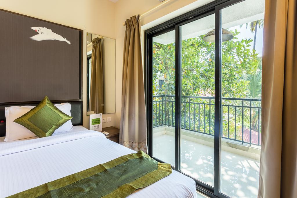 Treebo Trend Zeebo Suites Arpora Exterior foto