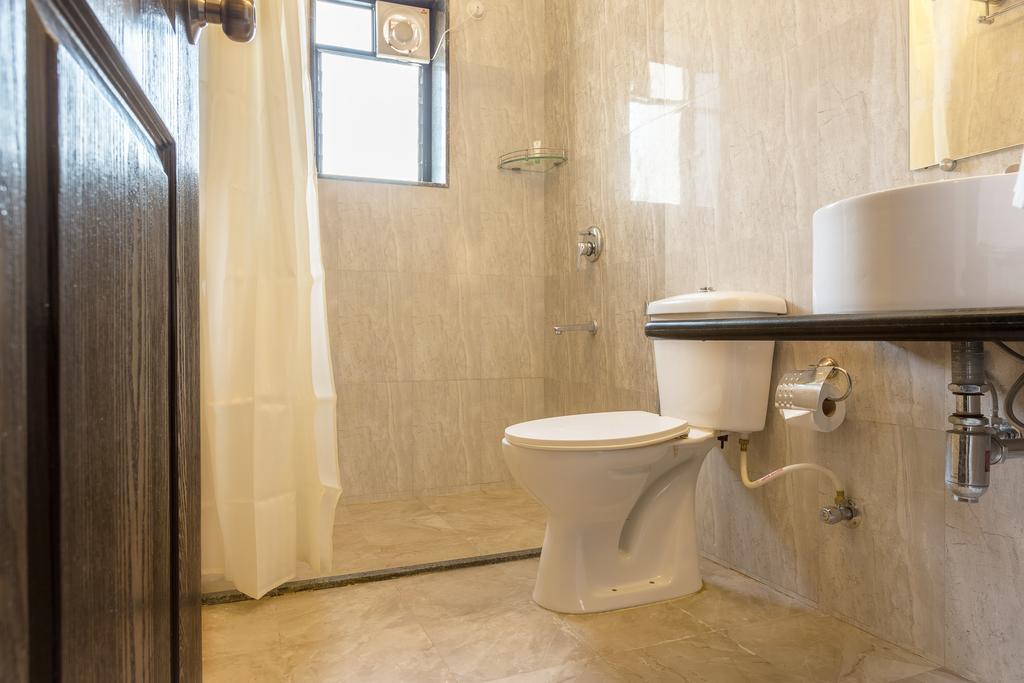 Treebo Trend Zeebo Suites Arpora Exterior foto