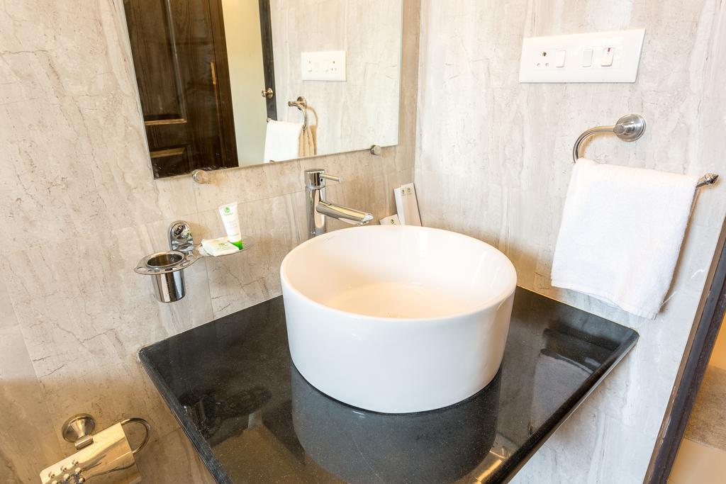 Treebo Trend Zeebo Suites Arpora Exterior foto