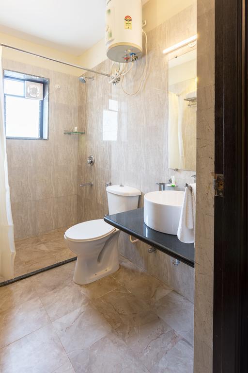 Treebo Trend Zeebo Suites Arpora Exterior foto